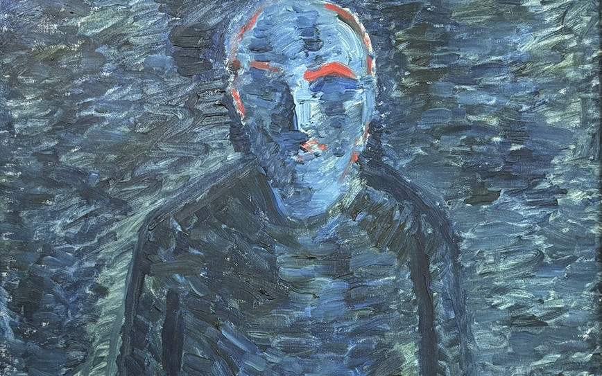 Mann i mørkre med raude detaljar